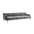 **Nowoczesna sofa z szaro-skalnym materiałem i metallicznymi nogami**