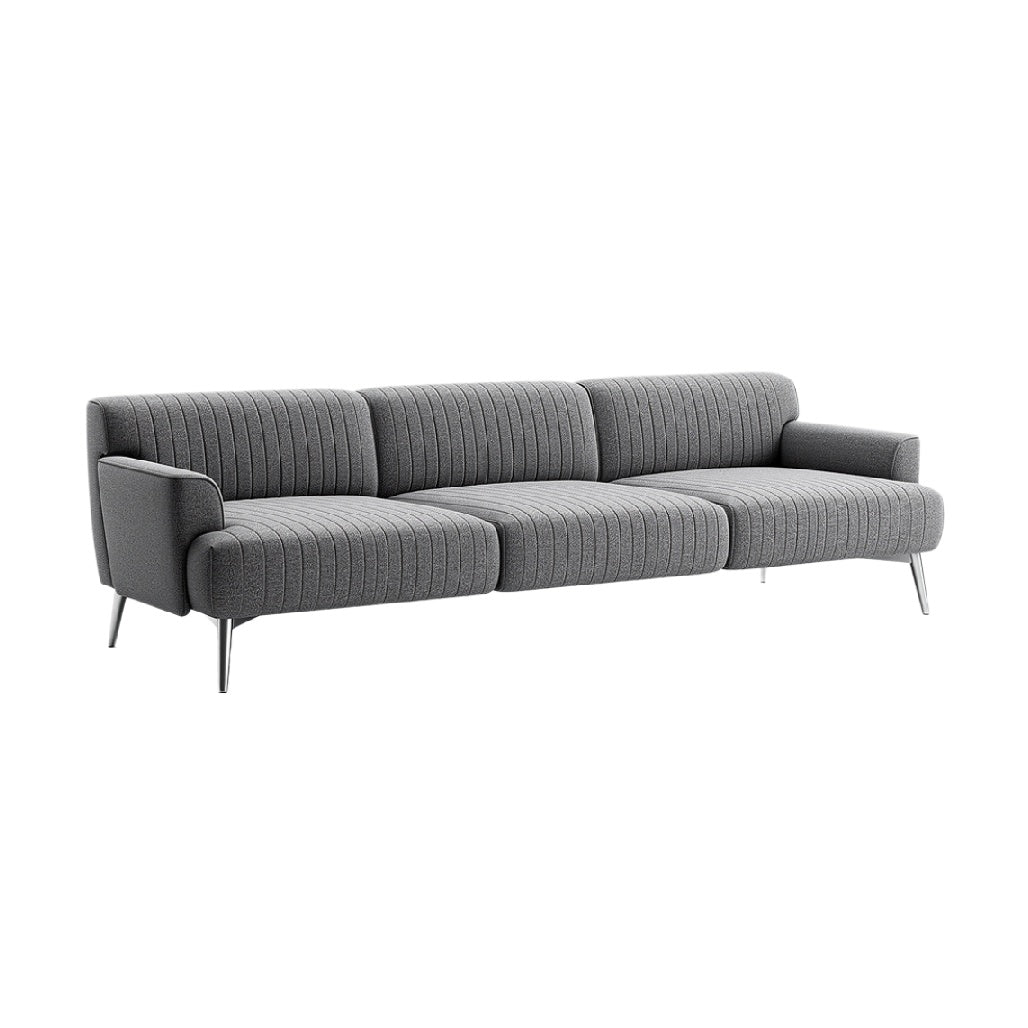 **Nowoczesna sofa z szaro-skalnym materiałem i metallicznymi nogami**